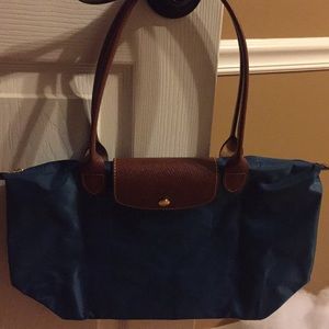 Authentic Longchamp bag never carried